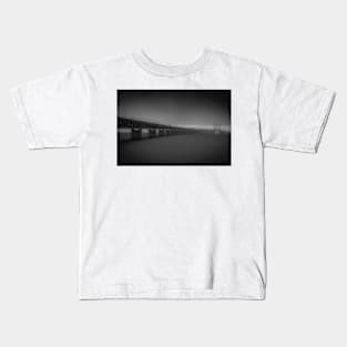 In the beautiful evening light lies the Öresund Bridge, which connects Sweden and Denmark Kids T-Shirt